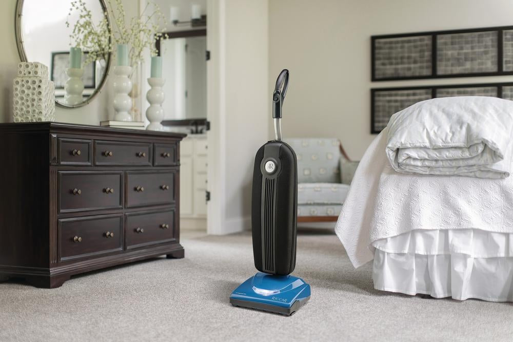Riccar Cordless SupraLite R10CV.10 in a bedroom