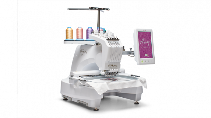 Baby Lock Array embroidery machine left side view with colorful thread spools on a white background