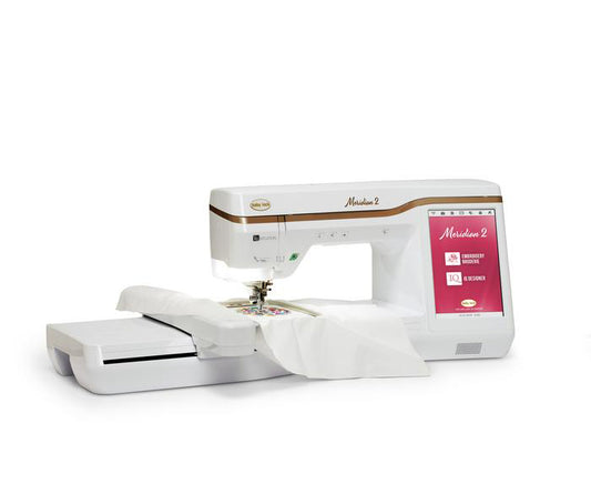 Baby Lock Meridian white sewing machine with a red label on a white background