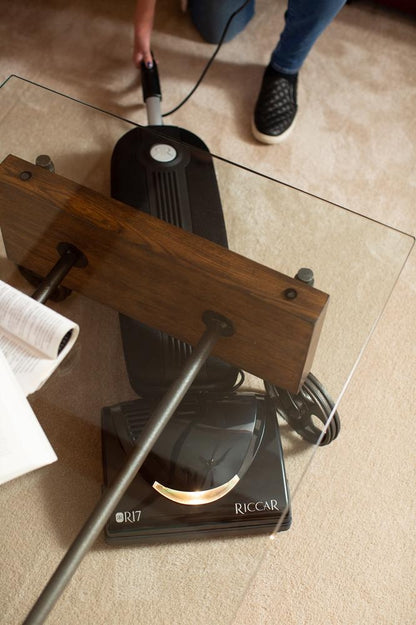 Riccar SupraLite R17.2 laying flat to clean under a table