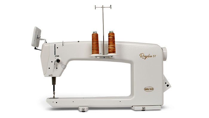 Baby Lock Regalia ST machine head side profile showing 20 inch throat space and thread spools