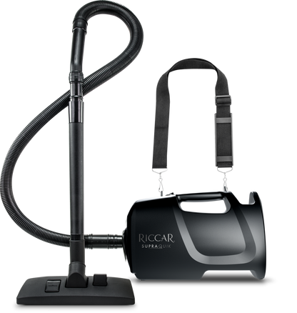 Riccar SupraQuik RSQ1.6 portable canister vacuum with hose, wand, floor tool and shoulder strap